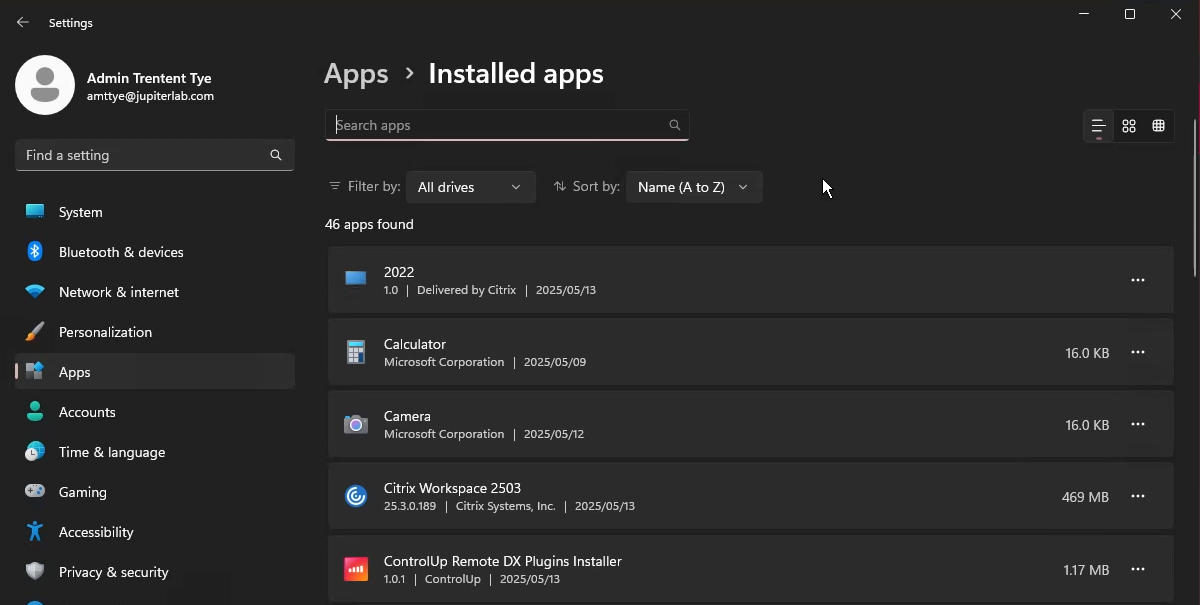 A screenshot of the Windows 11 "Settings" app, specifically the "Apps > Installed apps" section. The left sidebar shows "Apps" highlighted. The main panel displays a list of installed applications, with "46 apps found." A search bar is visible, along with filters for "All drives" and sorting by "Name (A to Z)." Visible apps include "2022," "Calculator," "Camera," "Citrix Workspace 2503," and "ControlUp Remote DX Plugins Installer," along with their sizes, publishers, and installation/delivery dates. The interface has a dark theme.